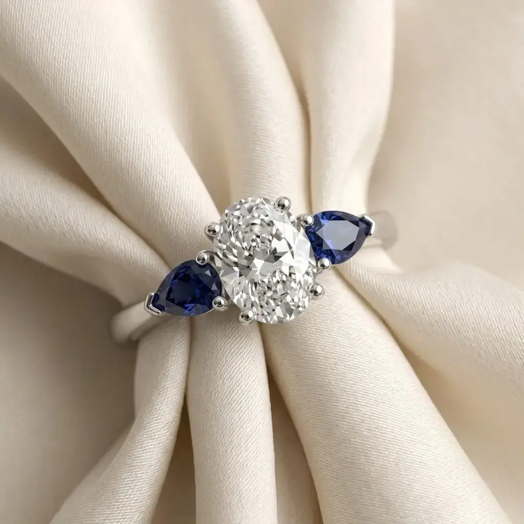 Classic Pear Shaped Sapphire Engagement Ring In Platinum