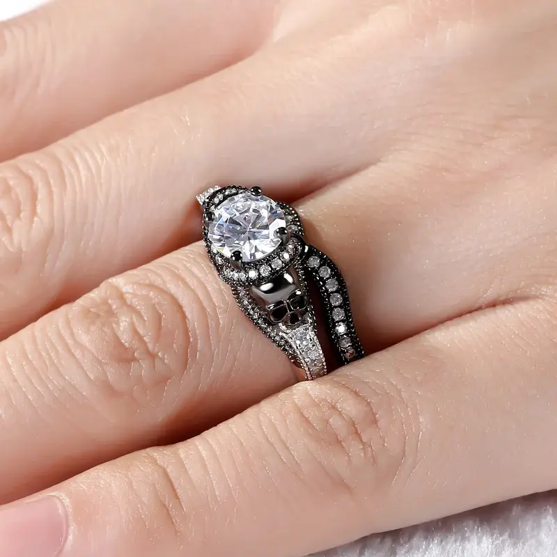 Jeulia Twist Two Tone Round Cut Sterling Silver Skull Ring